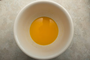 Melted margarine, sweetener and vanilla whisked together in a bowl