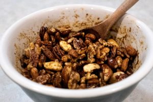 Oil and sugar-free maple syrup mixed into nuts and spices