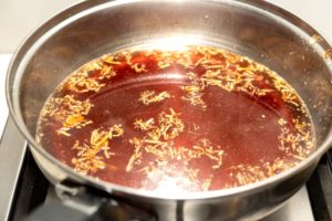Sauce heating in frying pan